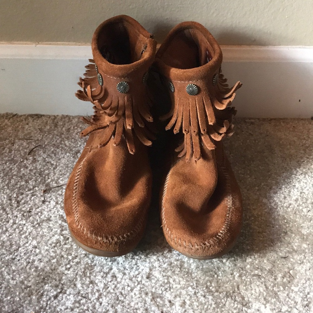 Fringed Minnetonka ankle boots